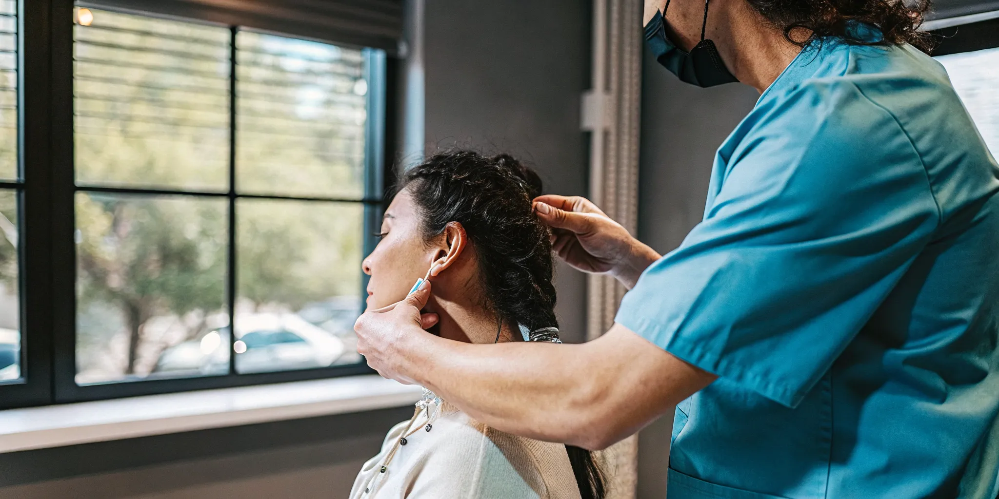 Chiropractor performing a gentle cervical adjustment for neck pain relief in Brooklyn