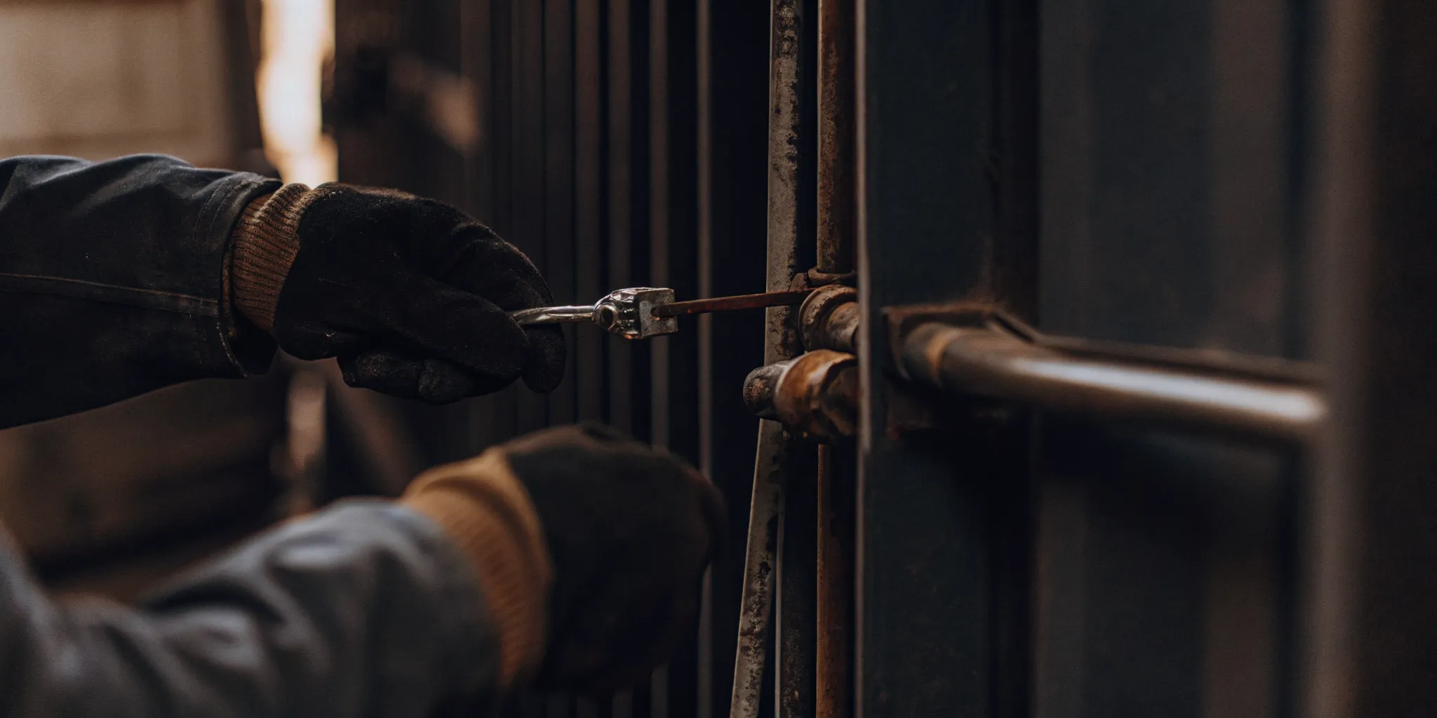 Inspector performing a VVTT check on a serialized high-security bolt seal