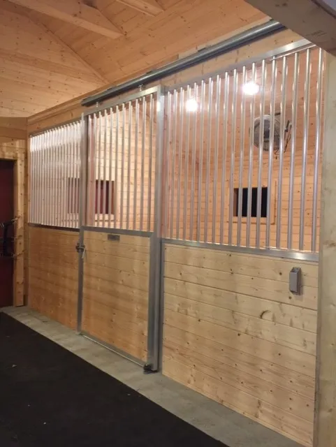 Installed Armour sliding stall door and horse stall front