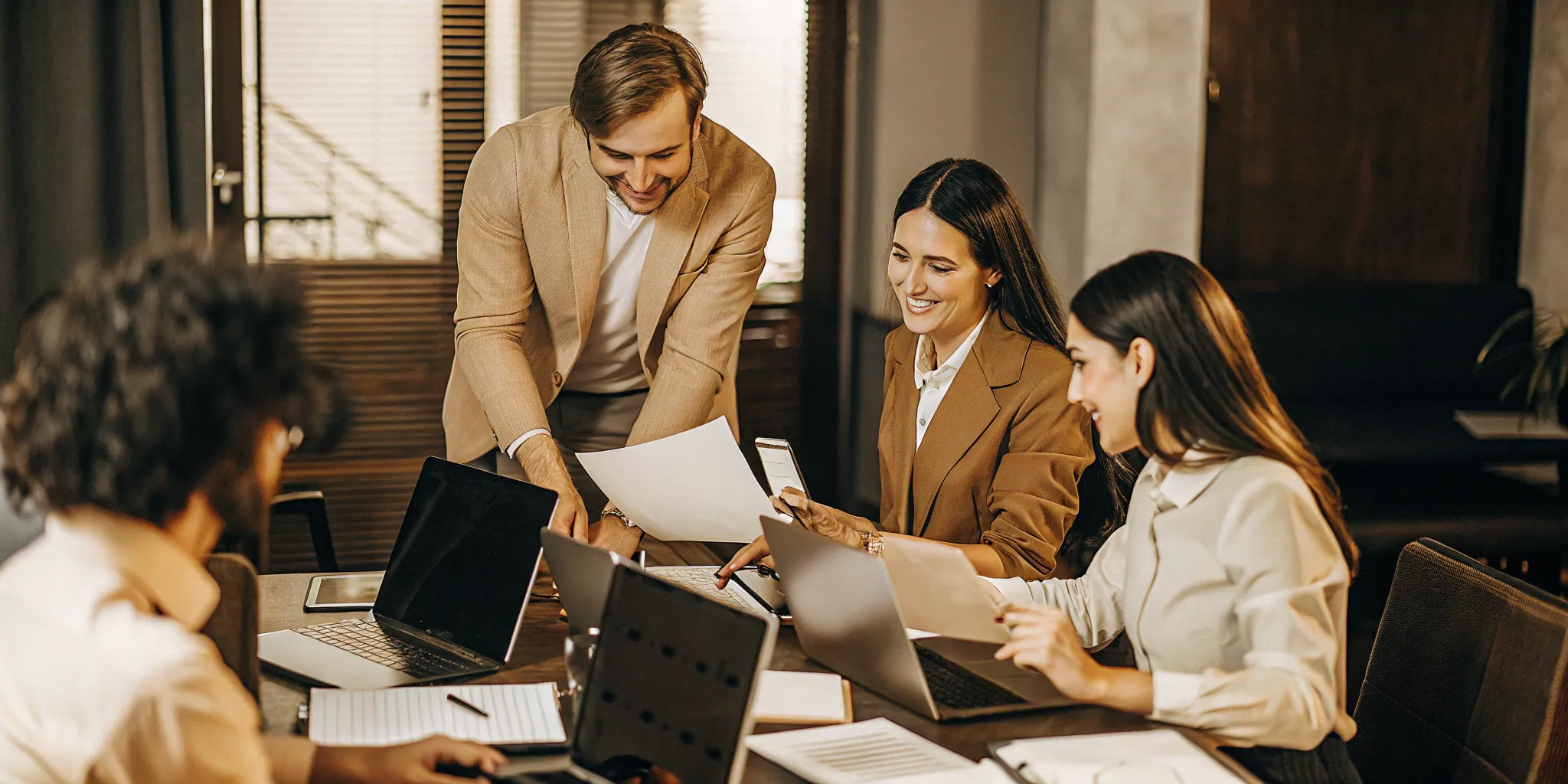 A team of agents collaborating on ways to improve morale and reduce attrition.