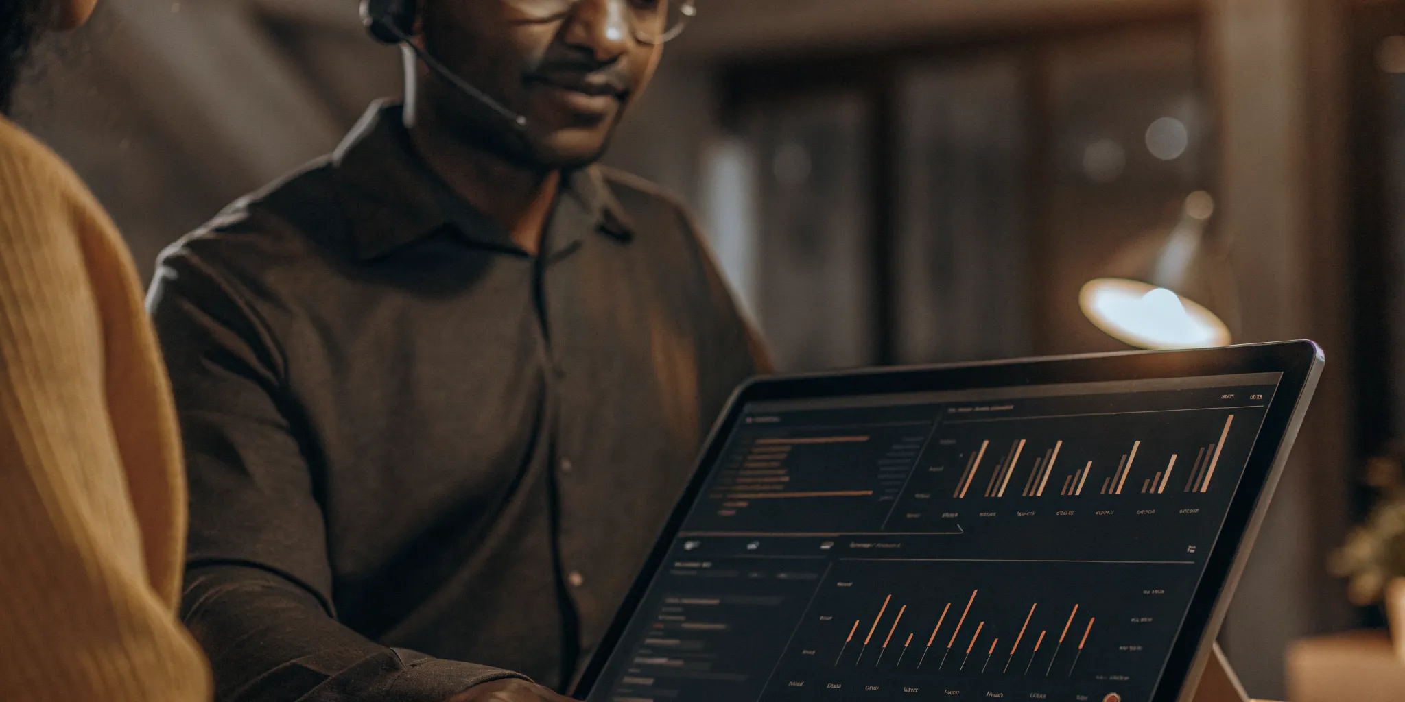 A professional contact center manager analyzing real-time data metrics on a sleek modern dashboard interface indicating knowledge base success and first call resolution improvements