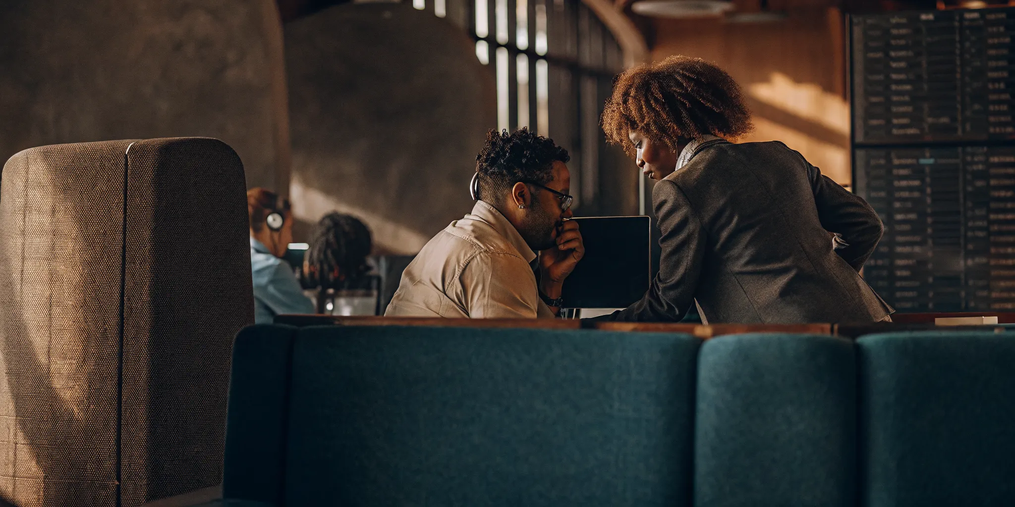 Contact center supervisor coaching an agent after a quality assurance review
