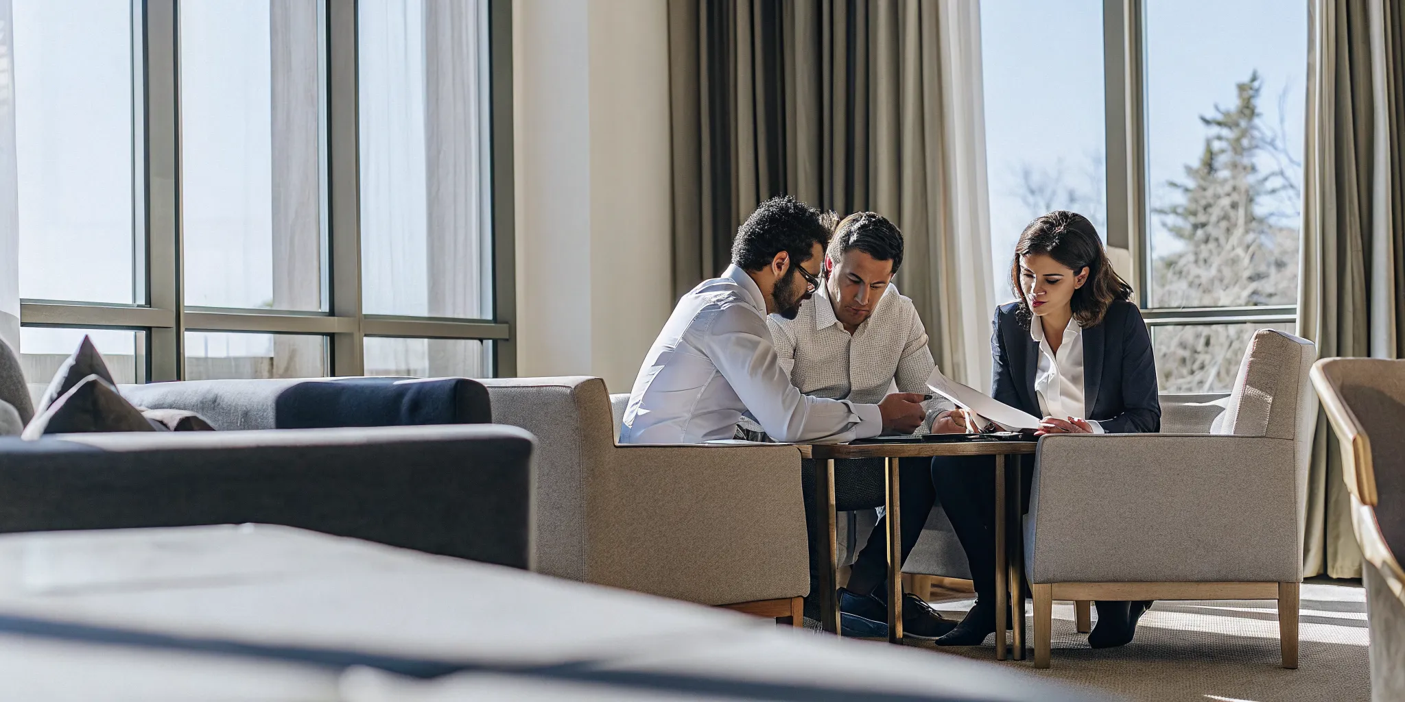 Tour operator finance team reviewing cost data around a meeting table