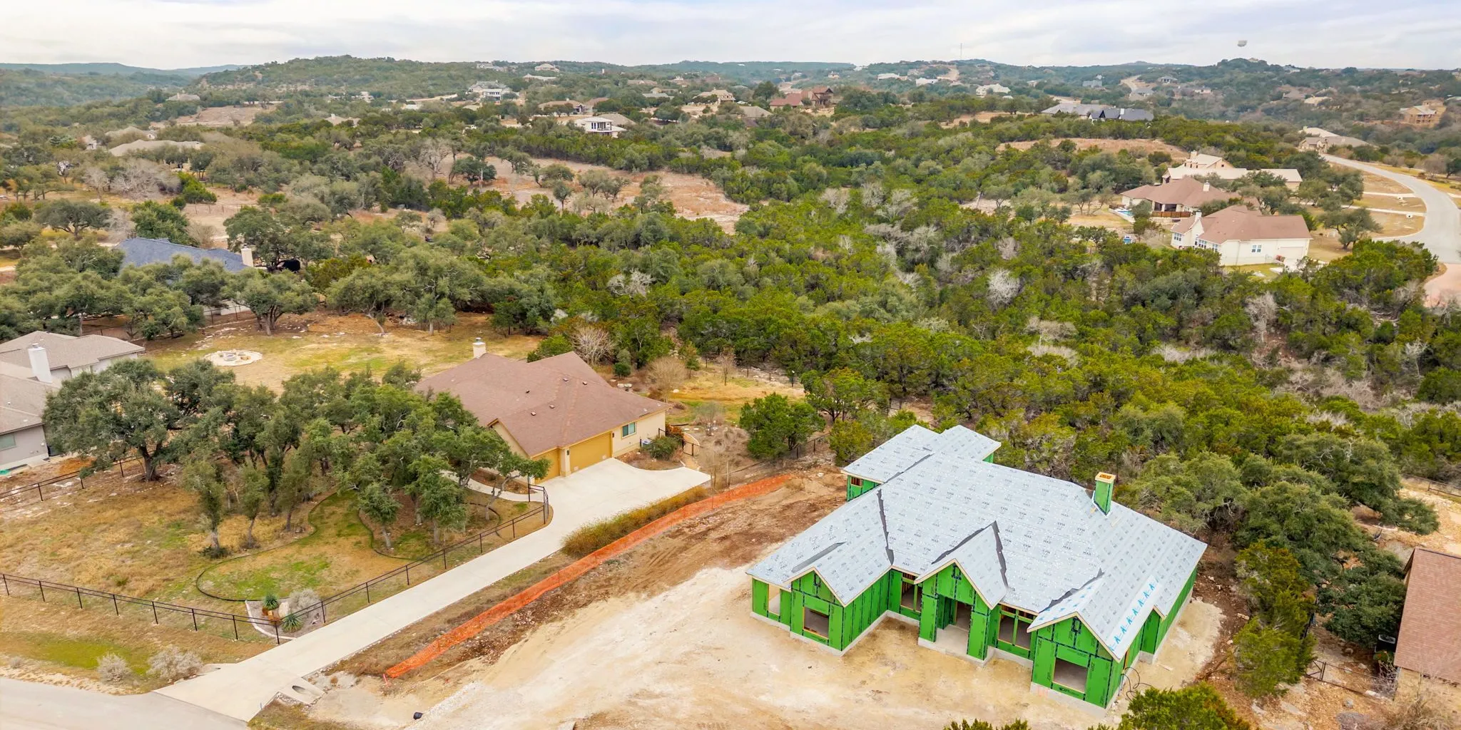 Modern Hill Country custom home on a hillside lot overlooking Canyon Lake