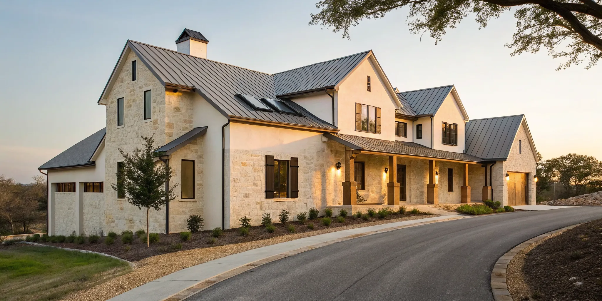 Modern new construction home in New Braunfels with a stone exterior and metal roof.