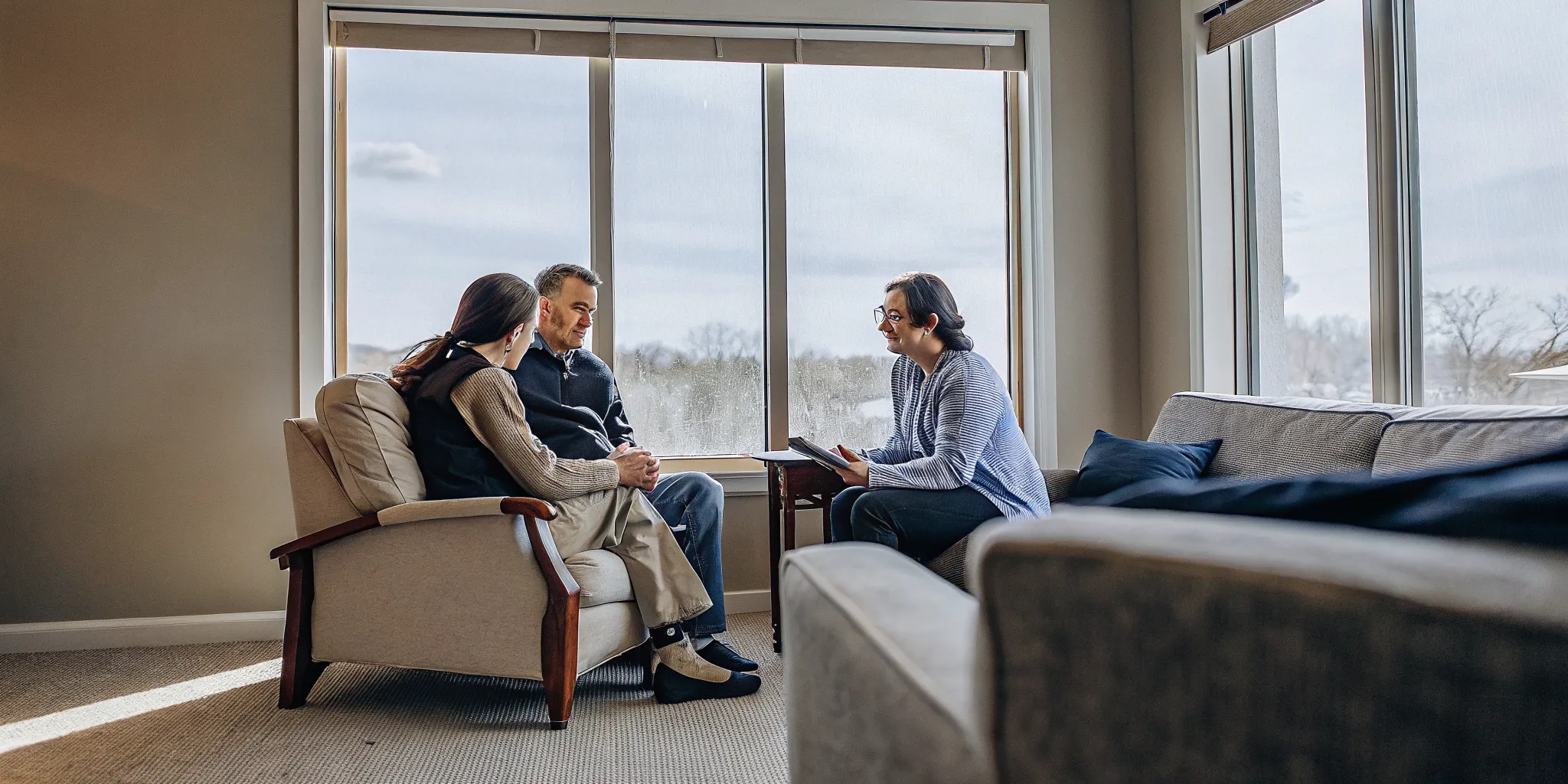 Family reviewing dual diagnosis treatment insurance benefits