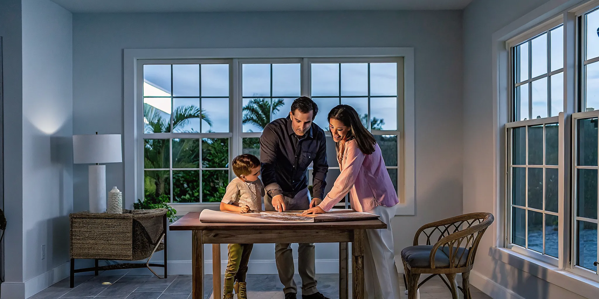Florida family planning home improvements around a wooden table using a cash-out refinance