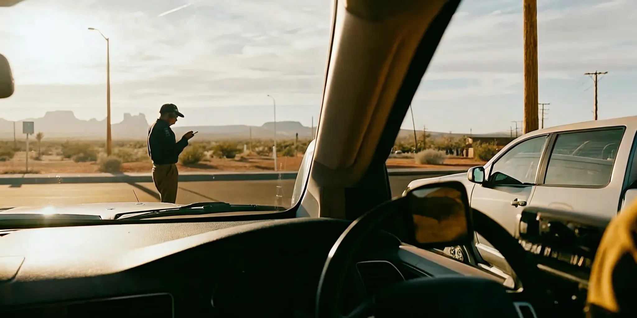 Technician helping a driver after a missed ignition interlock calibration appointment