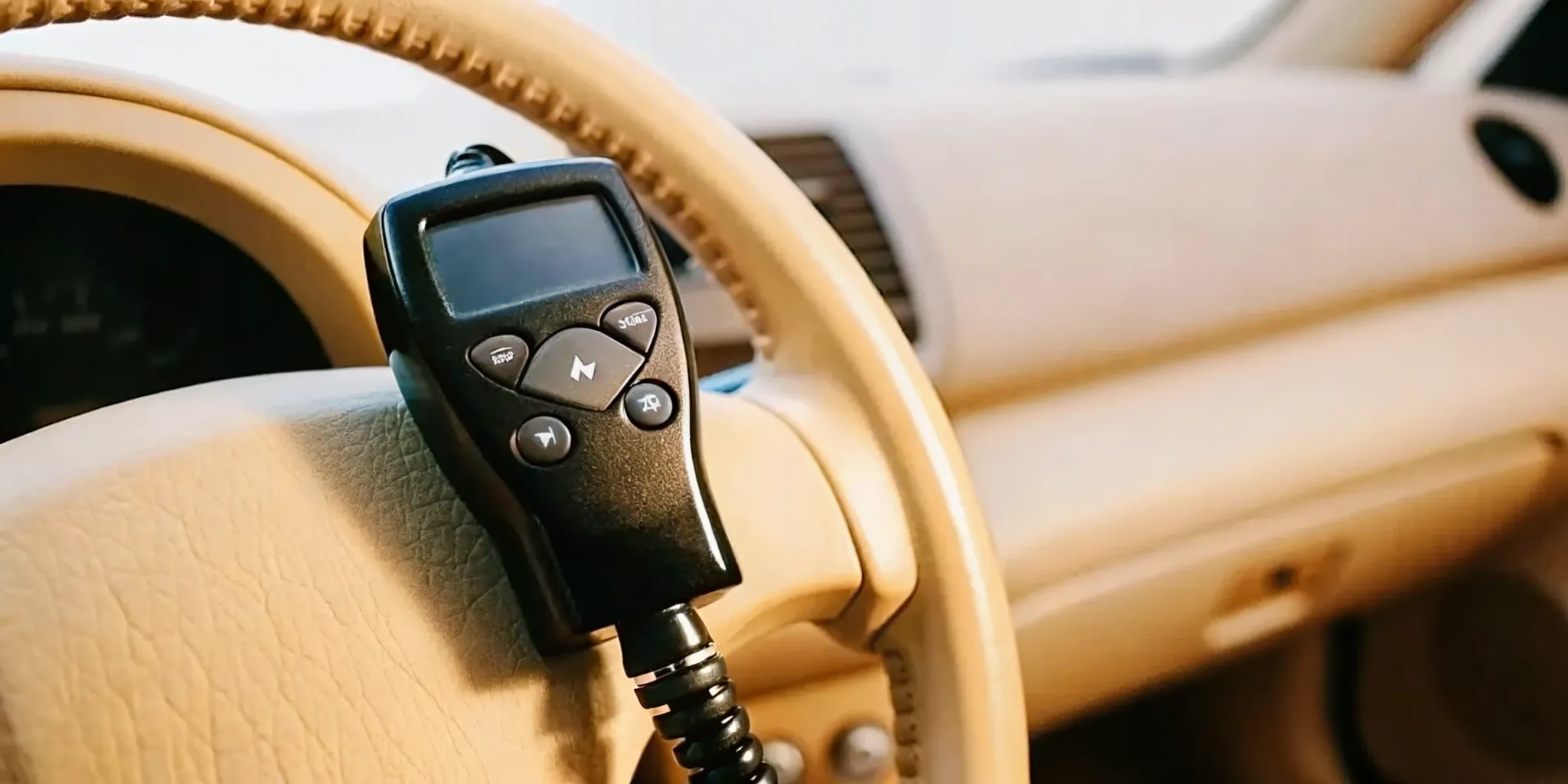 Ignition interlock device installed near the steering wheel of a car