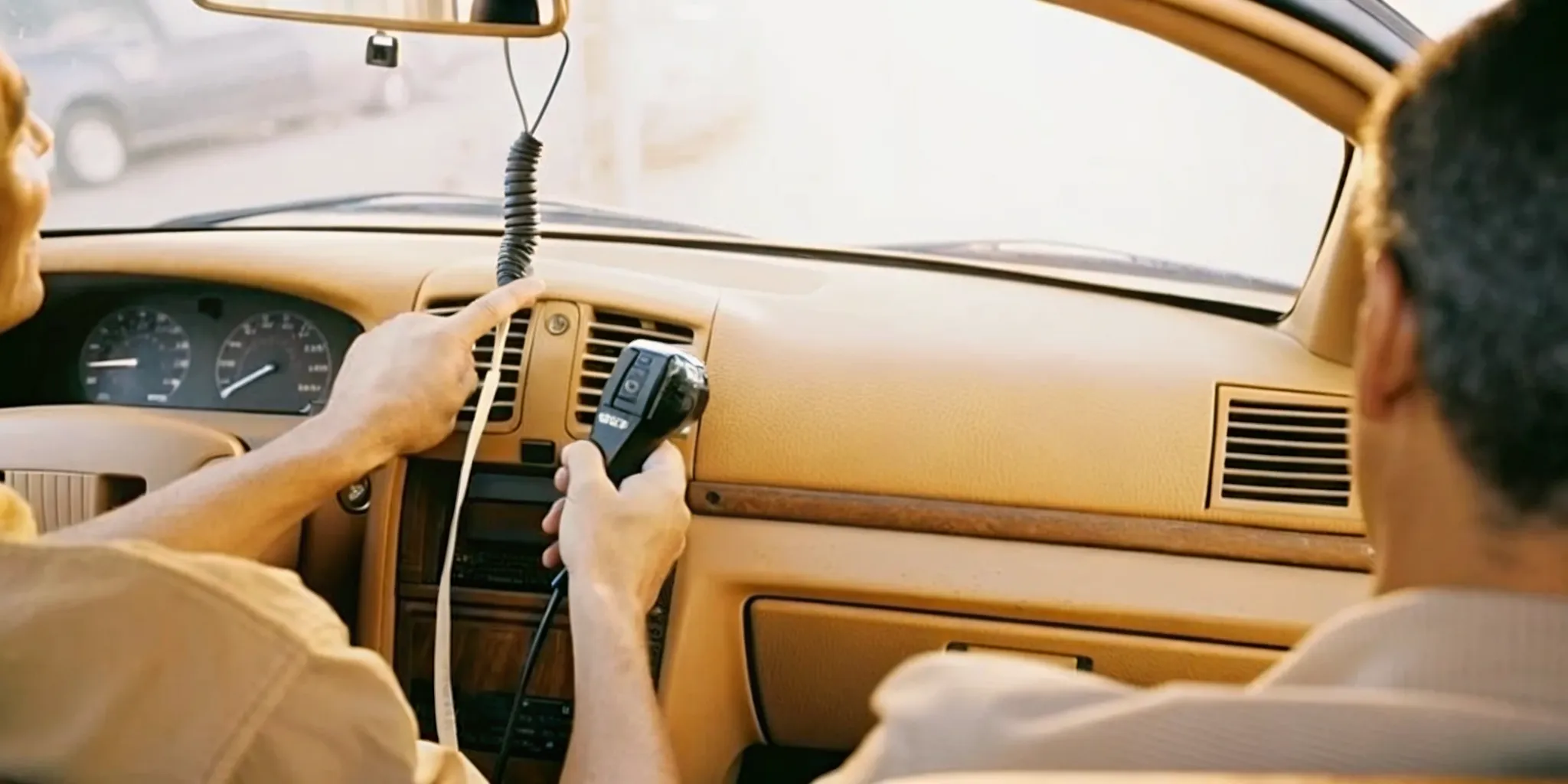 Technician installing a certified ignition interlock device in a car dashboard in Arizona