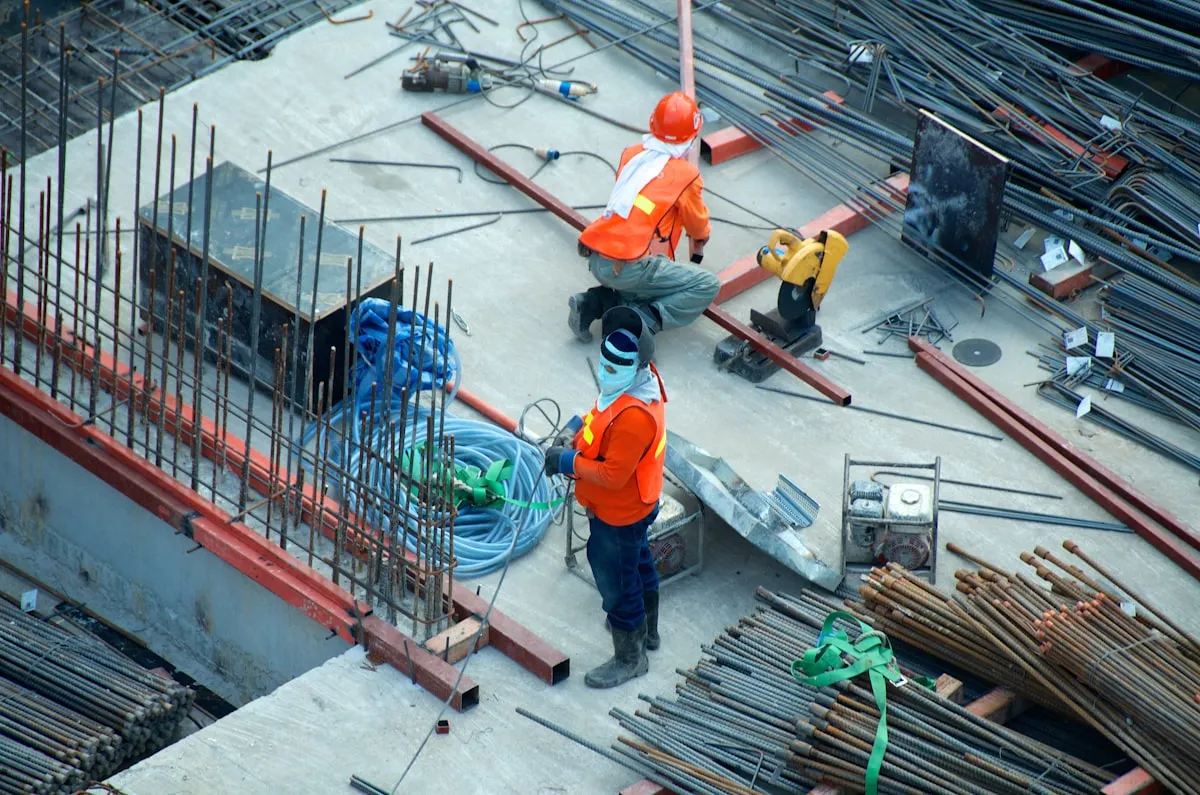 Construction site in NYC with safety barriers and permit signage