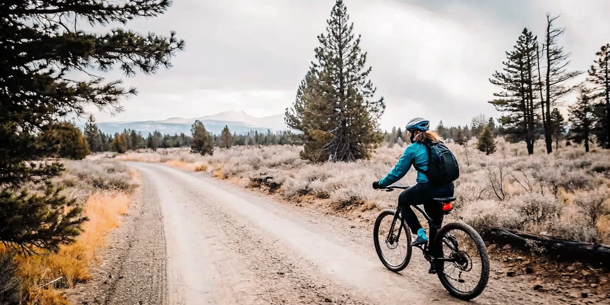 E-bike rider on a permitted gravel forest road near Bend Oregon