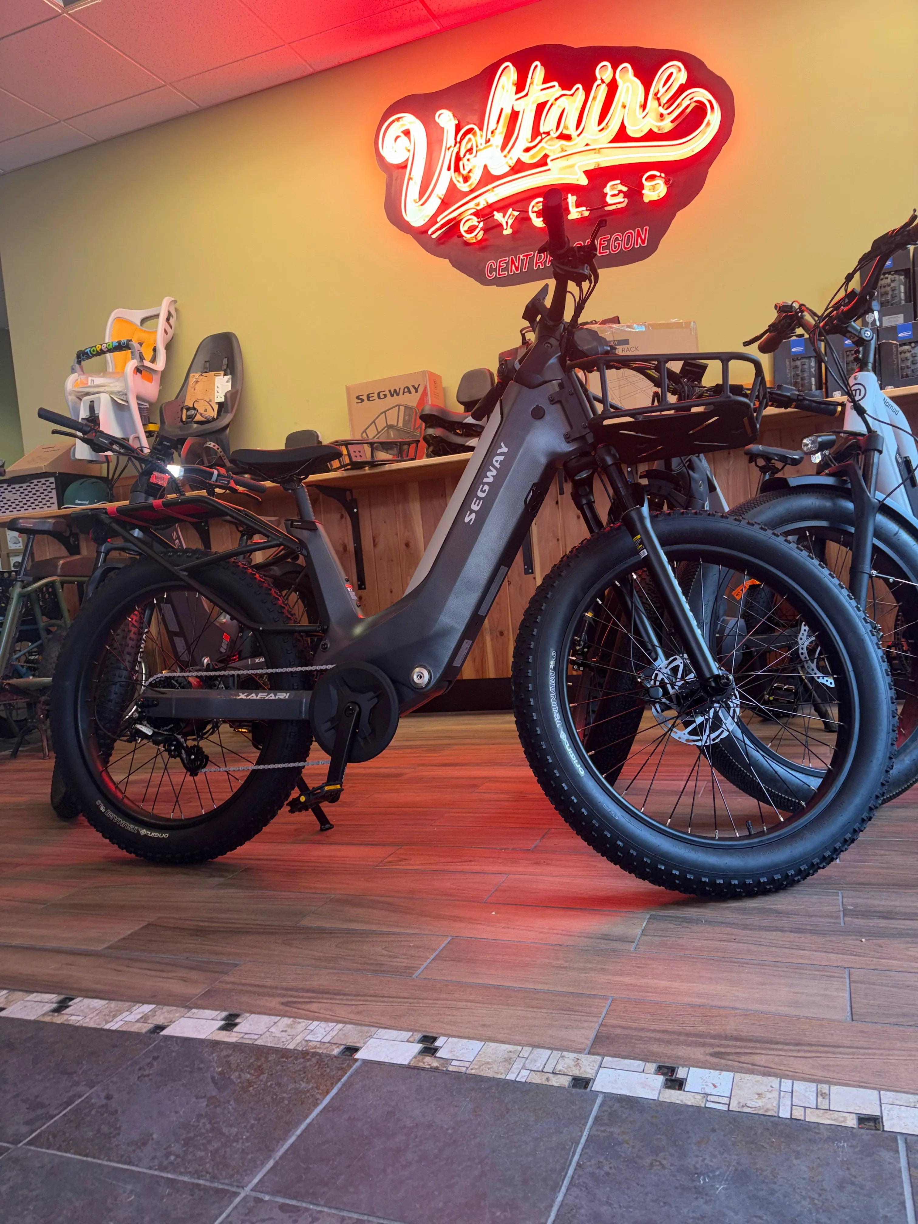 A customer test rides a torc sensing ebike for heavy riders at the Voltaire Cycles showroom in Bend, Oregon.