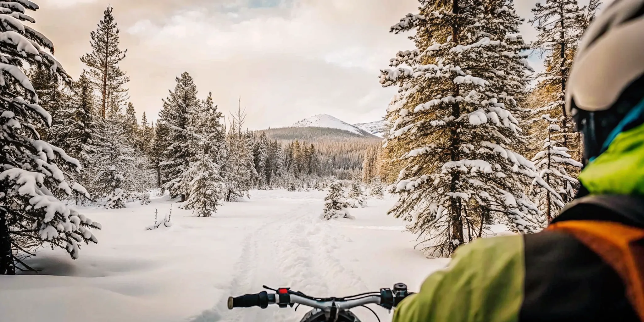 Rider using an electric snow bike on a Central Oregon winter trail