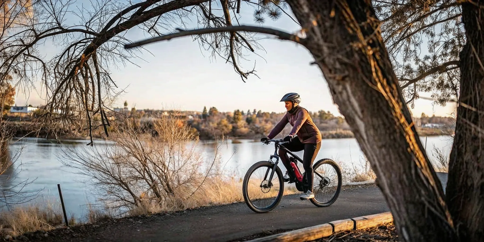 Rider pedaling a torque-sensing ebike on a Central Oregon trail, showing natural pedal assist feel