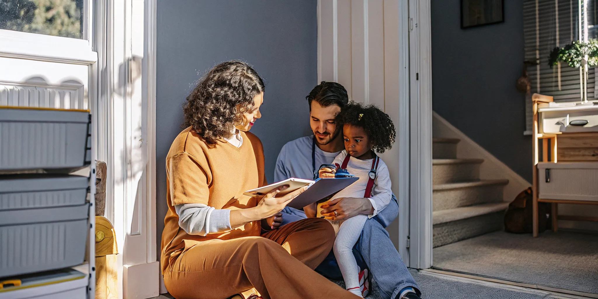 Georgia parent and pediatric home nurse reviewing a care plan