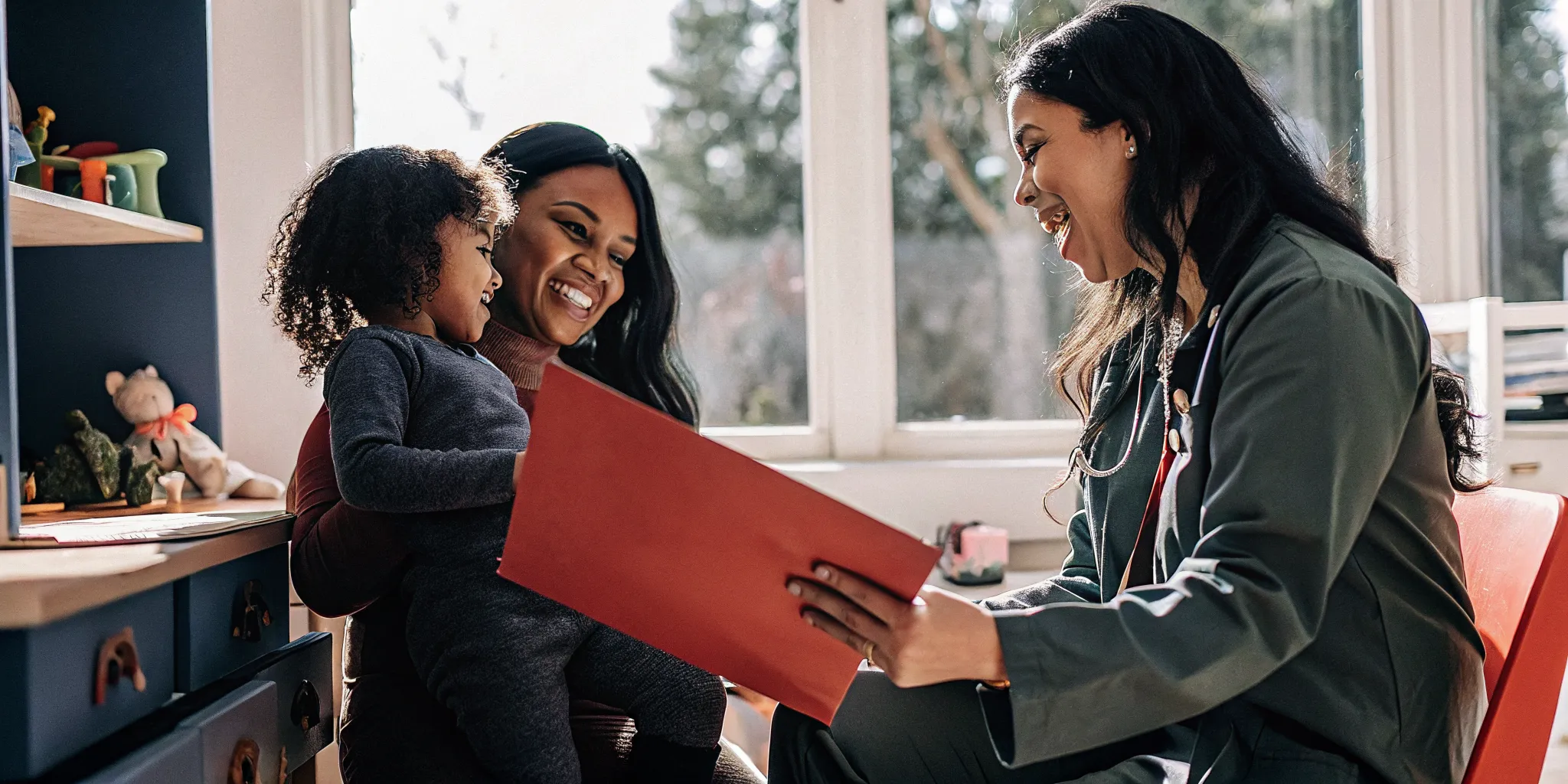 A professional GAPP home health nurse helping a child and parent understand in-home pediatric nursing care plans