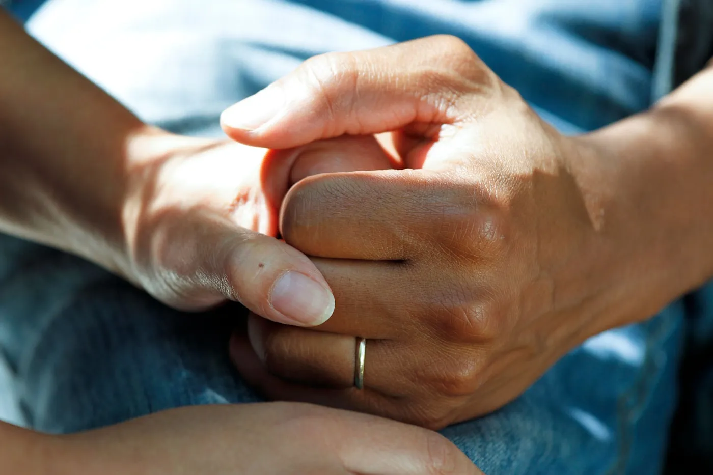 Medical professional reviewing injury information with a patient in a consultation room