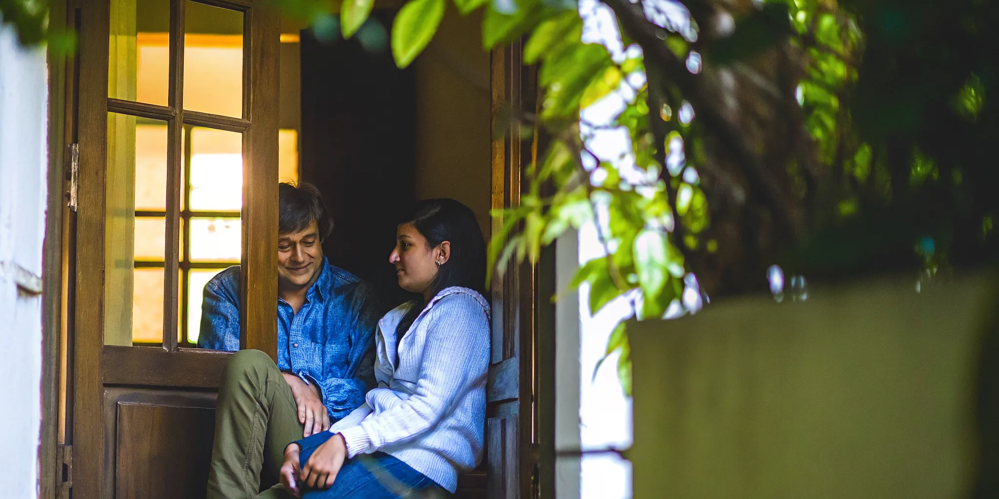 A family member speaking with compassion to a loved one during recovery