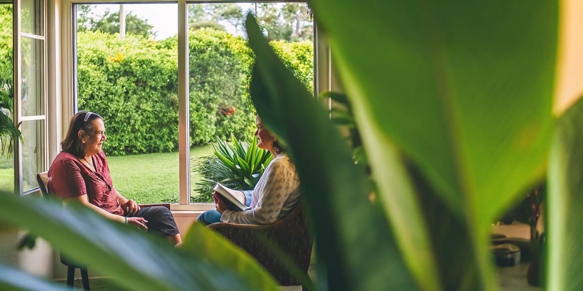 Counselor and client planning an outpatient rehab schedule