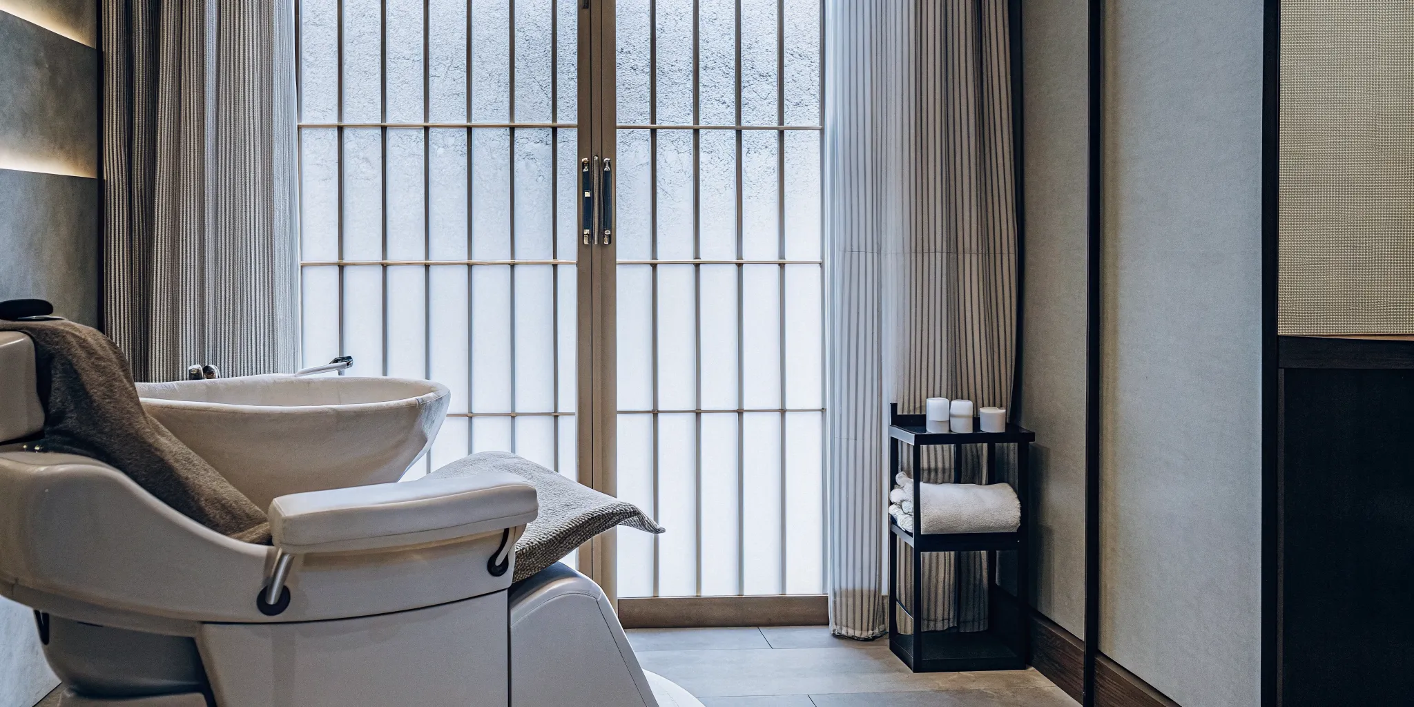 Luxurious Japanese head spa treatment room at The Sage HeadSpa with water halo basin and treatment chair