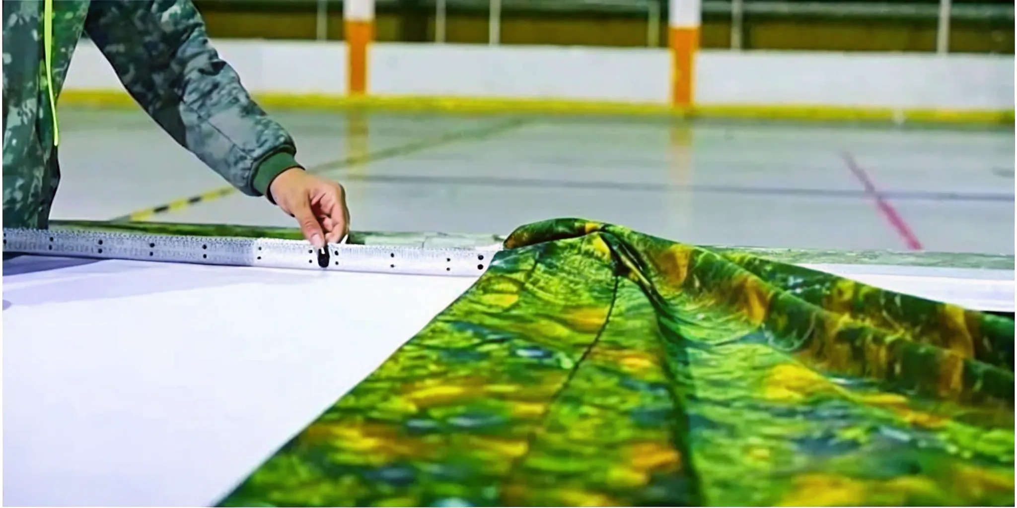 Sublimated hockey jerseys being checked in an apparel workshop
