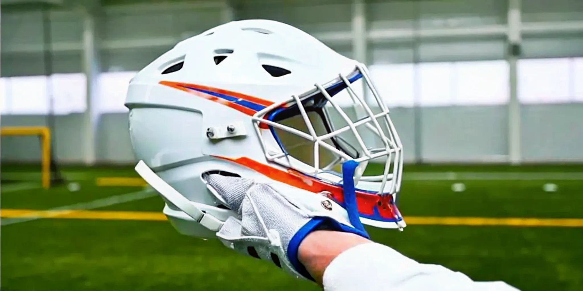 Custom decals fitted to an indoor box lacrosse helmet