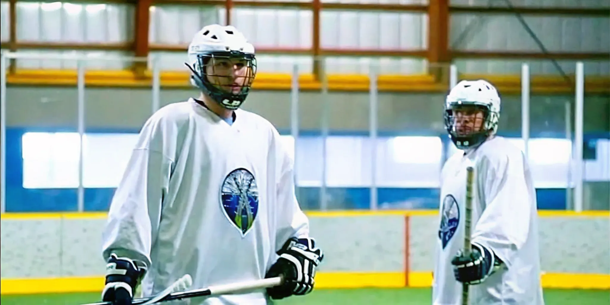 Box lacrosse players wearing breathable performance jersey fabric