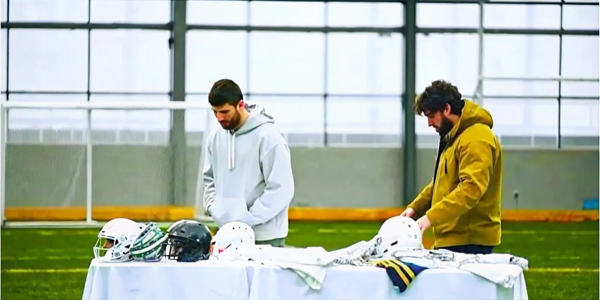 Box lacrosse club players browsing apparel for a team store fundraiser