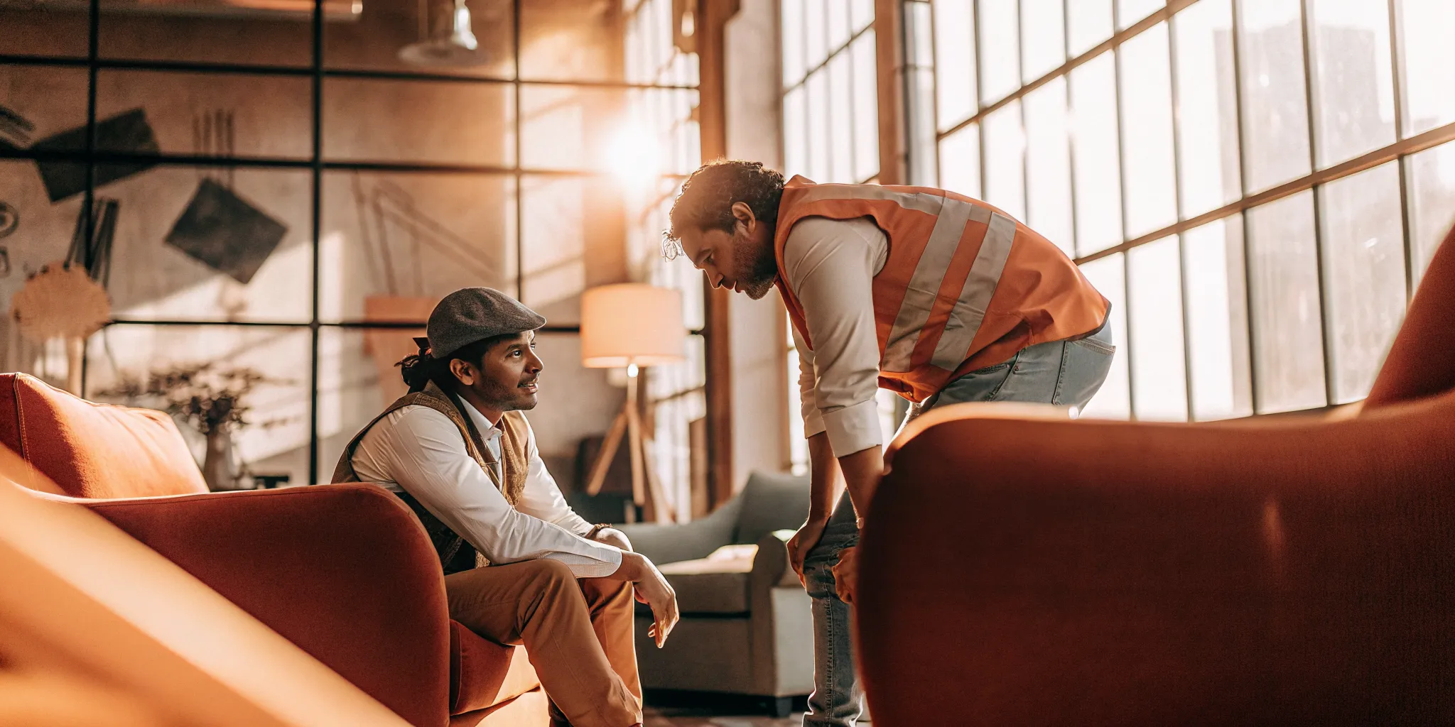 Injured worker reviewing compensation paperwork with a Florida workers comp lawyer