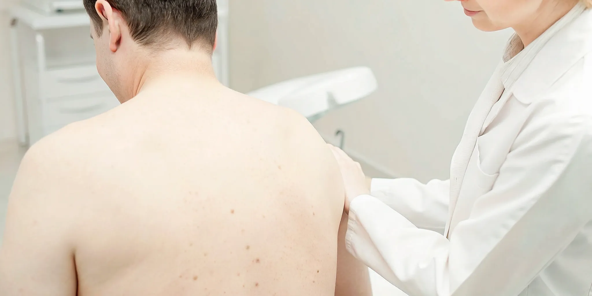 Professional consultation for men's back and shoulder laser hair removal
