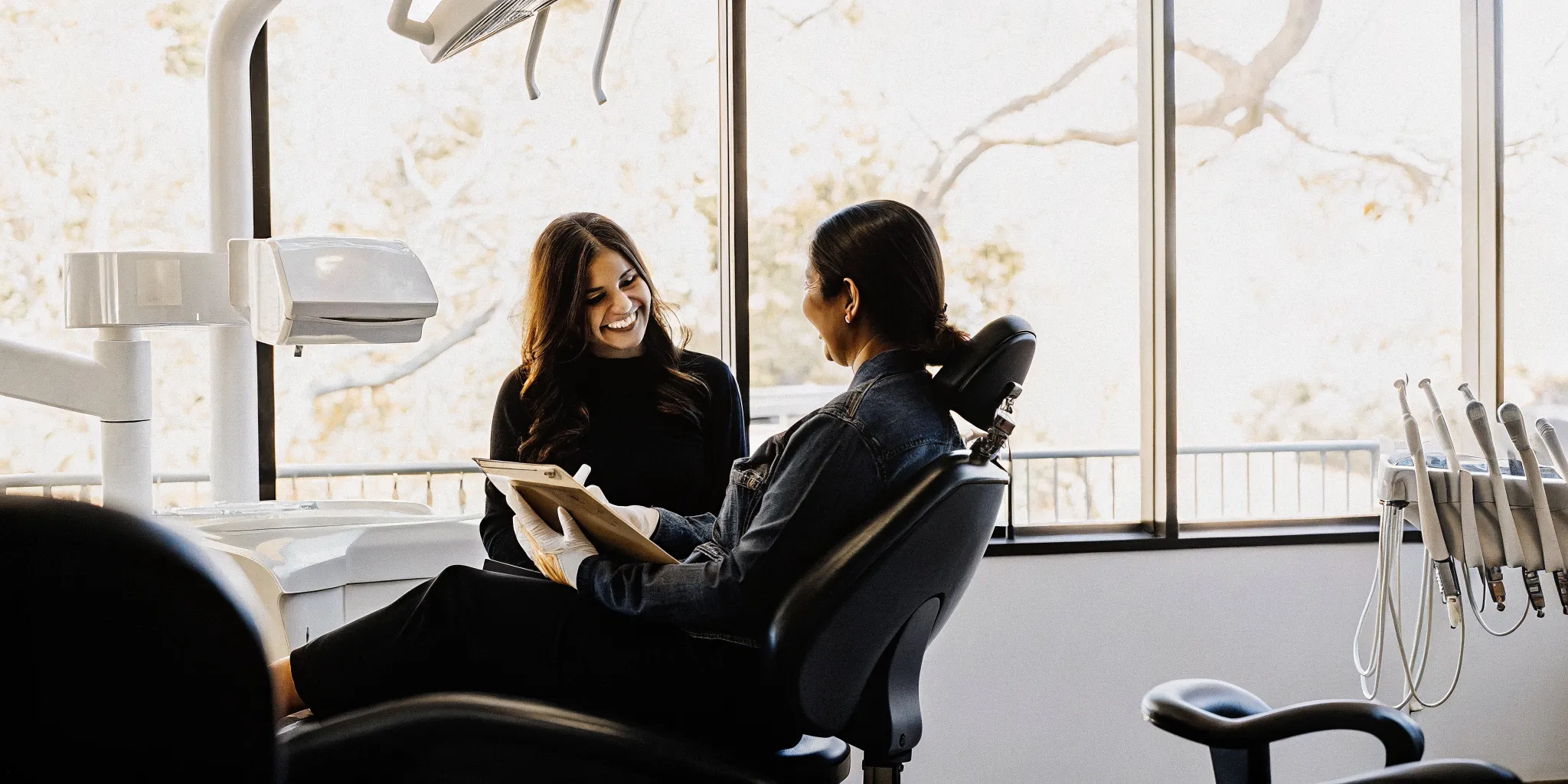 San Diego patient reviewing dental implant cost options during a consultation