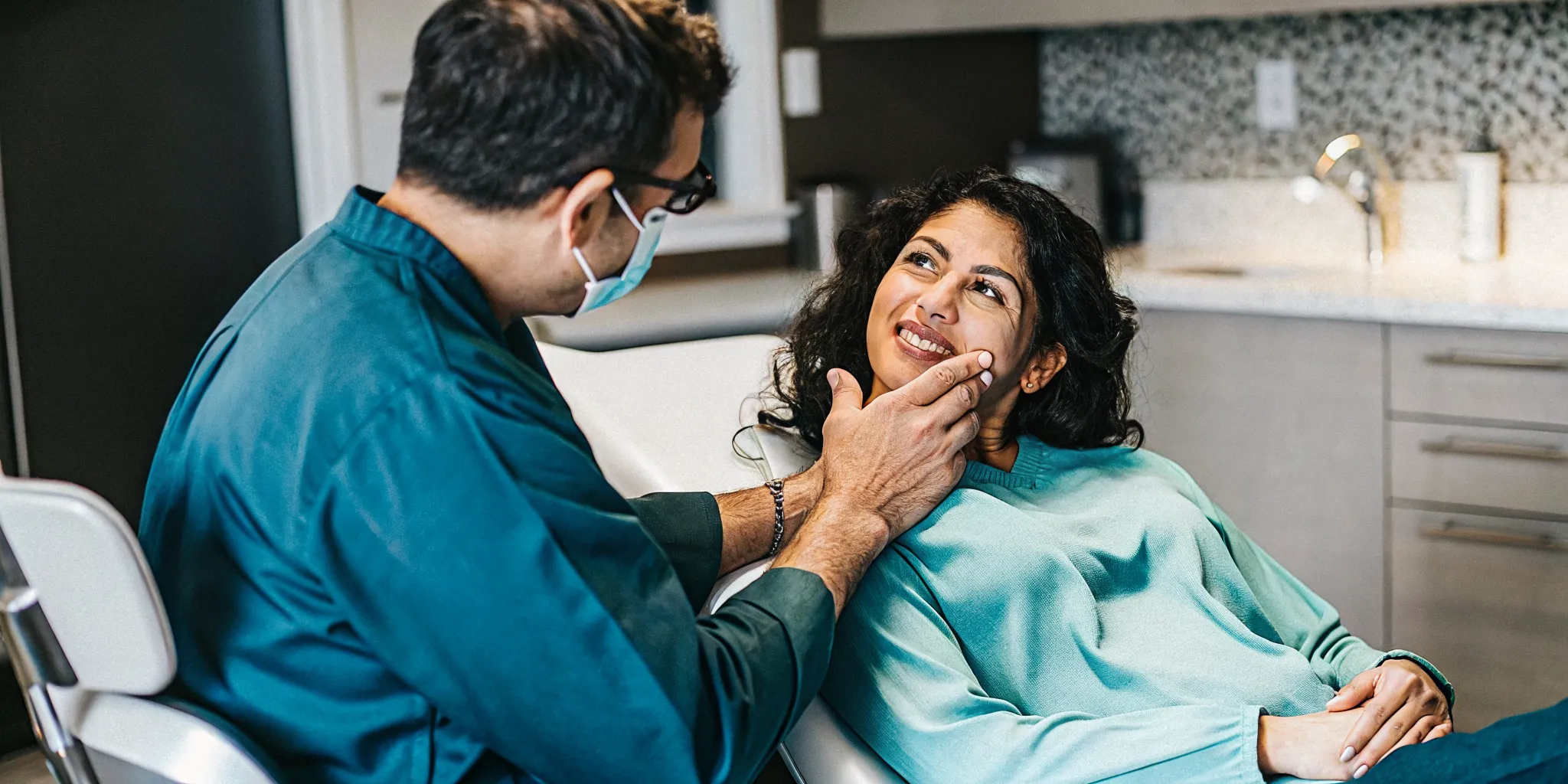 Dentist explaining sedation options for dental anxiety in San Diego