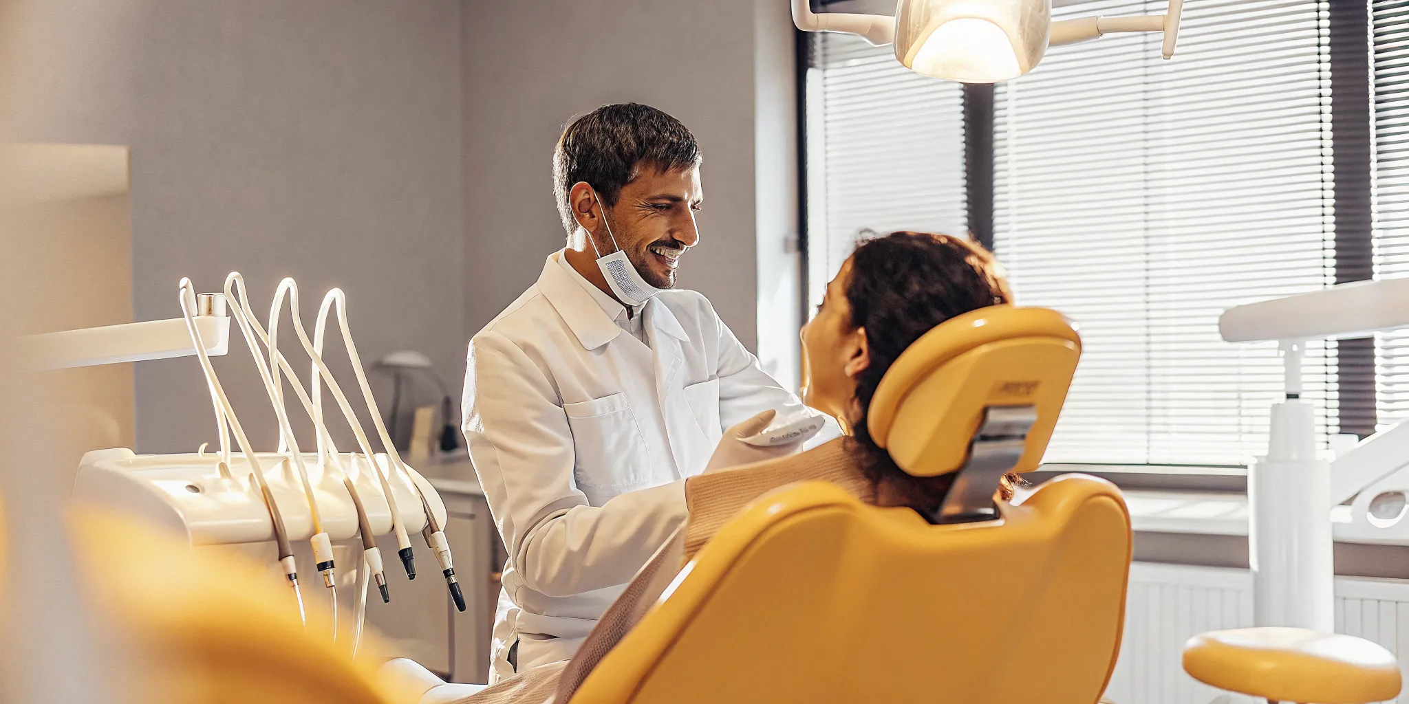 Dentist explaining comfort and sedation options to a patient