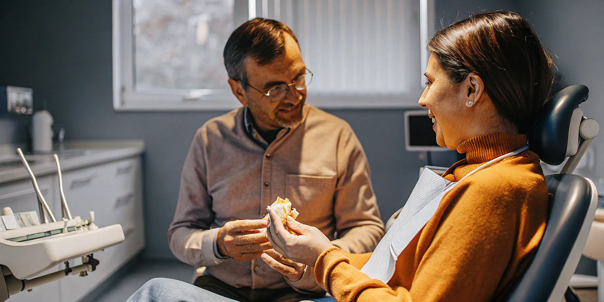 San Diego dentist discussing mini dental implants with a patient