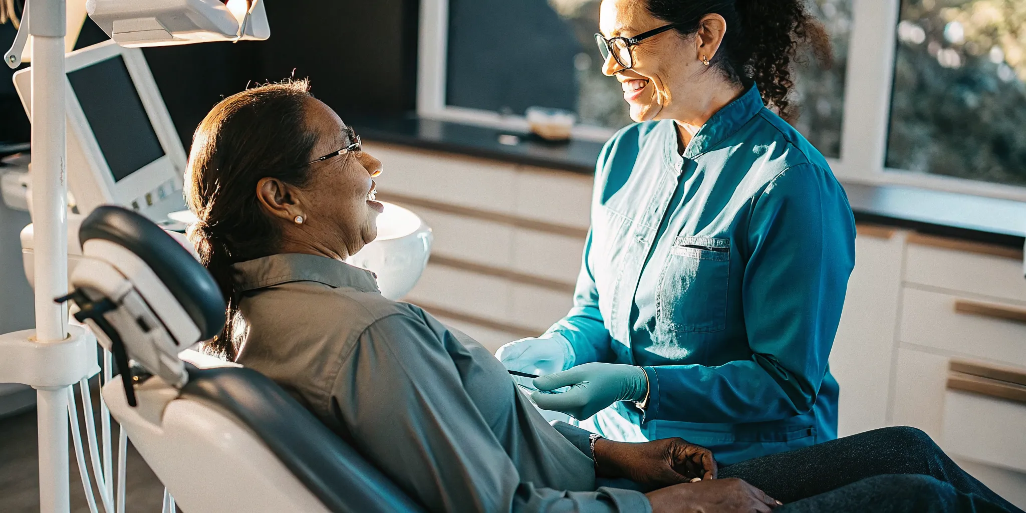 Dental implant procedure in a modern San Diego dental office with caring dentist and comfortable patient