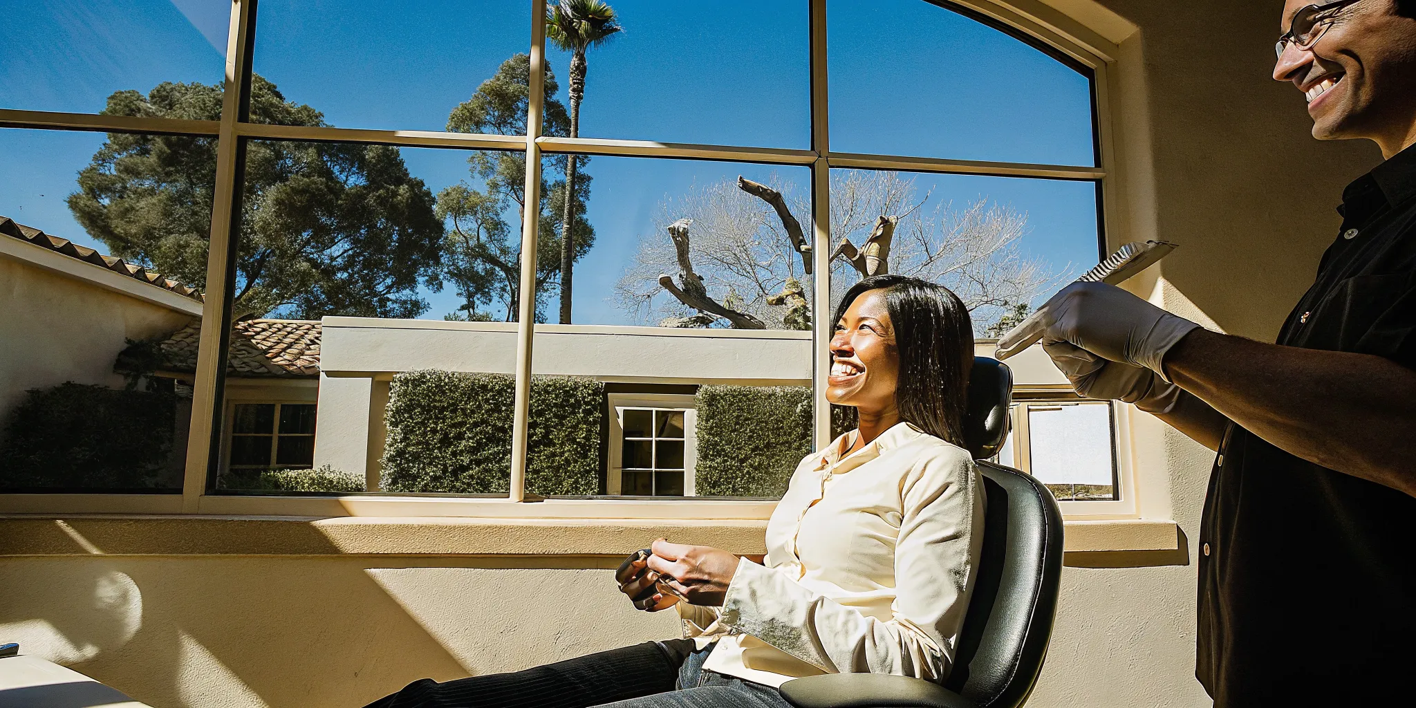 Dentist discussing Zoom teeth whitening options with a San Diego patient