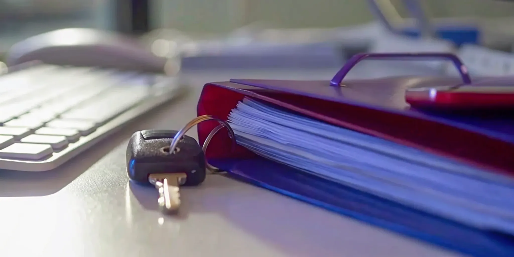 Auto glass insurance claim paperwork and documents on a desk