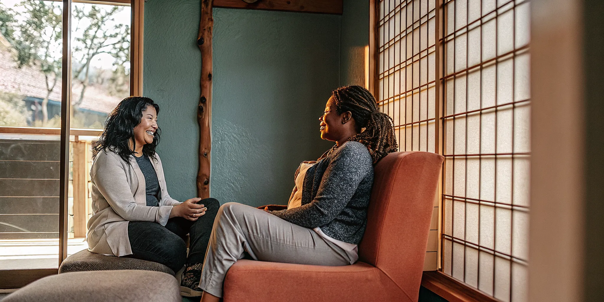 therapist and client discussing insurance coverage in a serene outpatient office