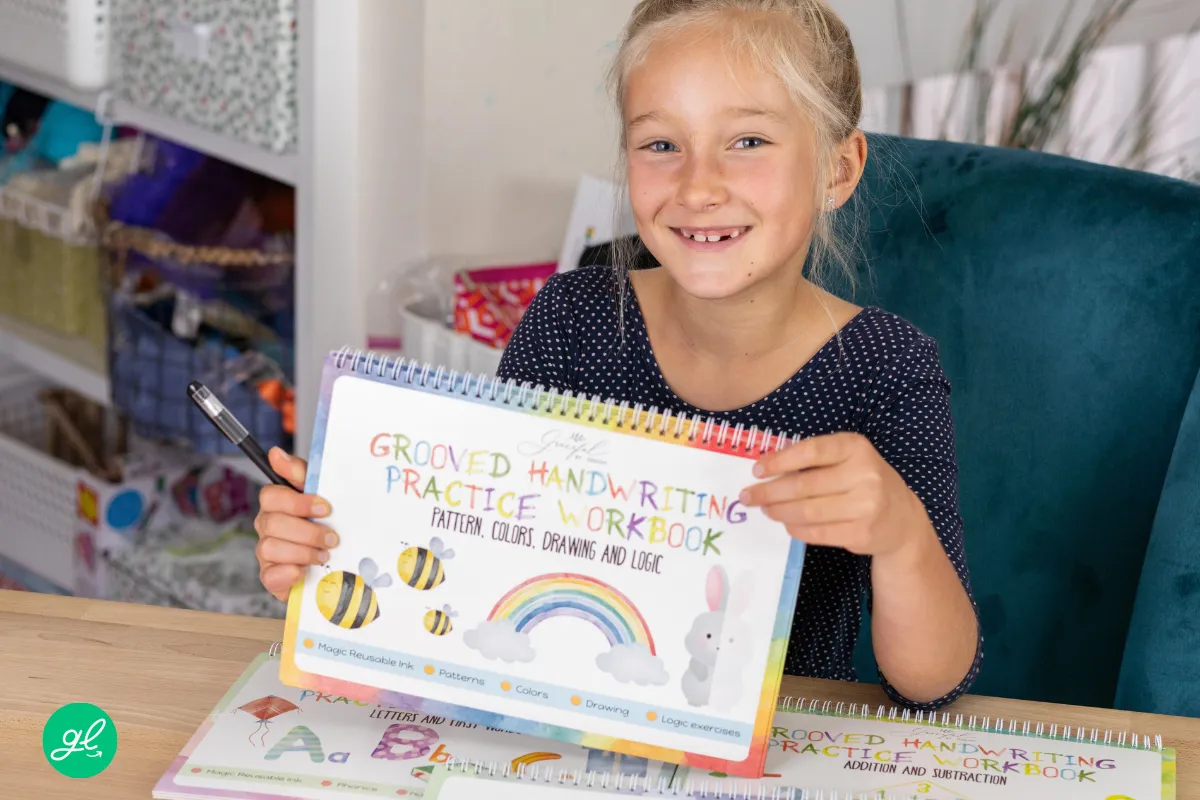 Parent helping a child choose a cursive handwriting workbook at home