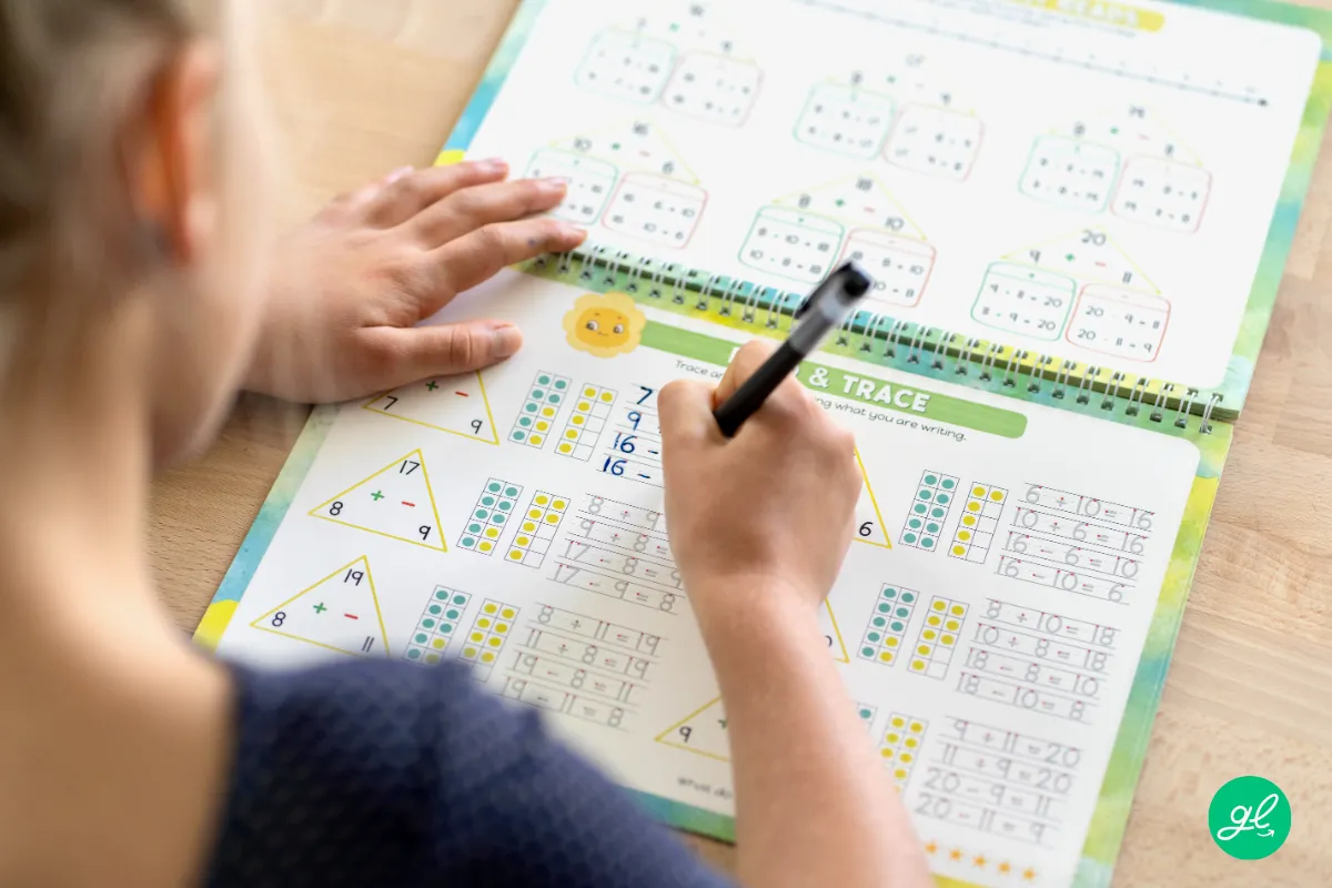 Hands-on letter tracing and word building game with multisensory cards