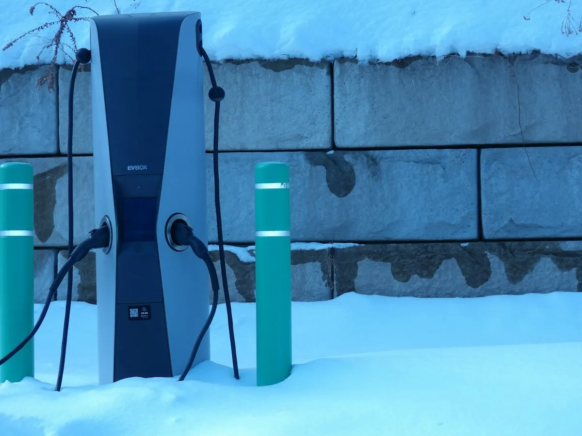Electric vehicle parked on a snowy winter road