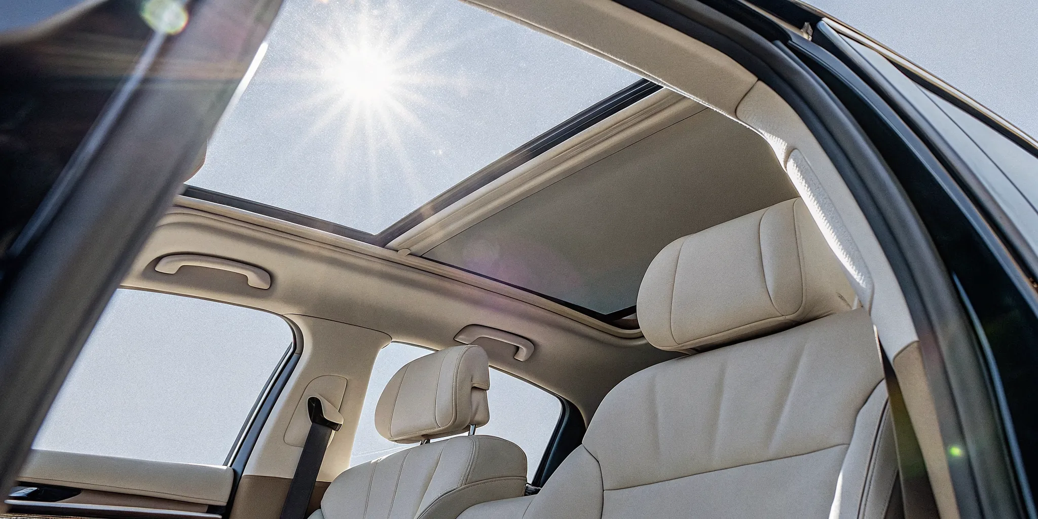 Freshly cleaned modern car cabin aired out in natural light