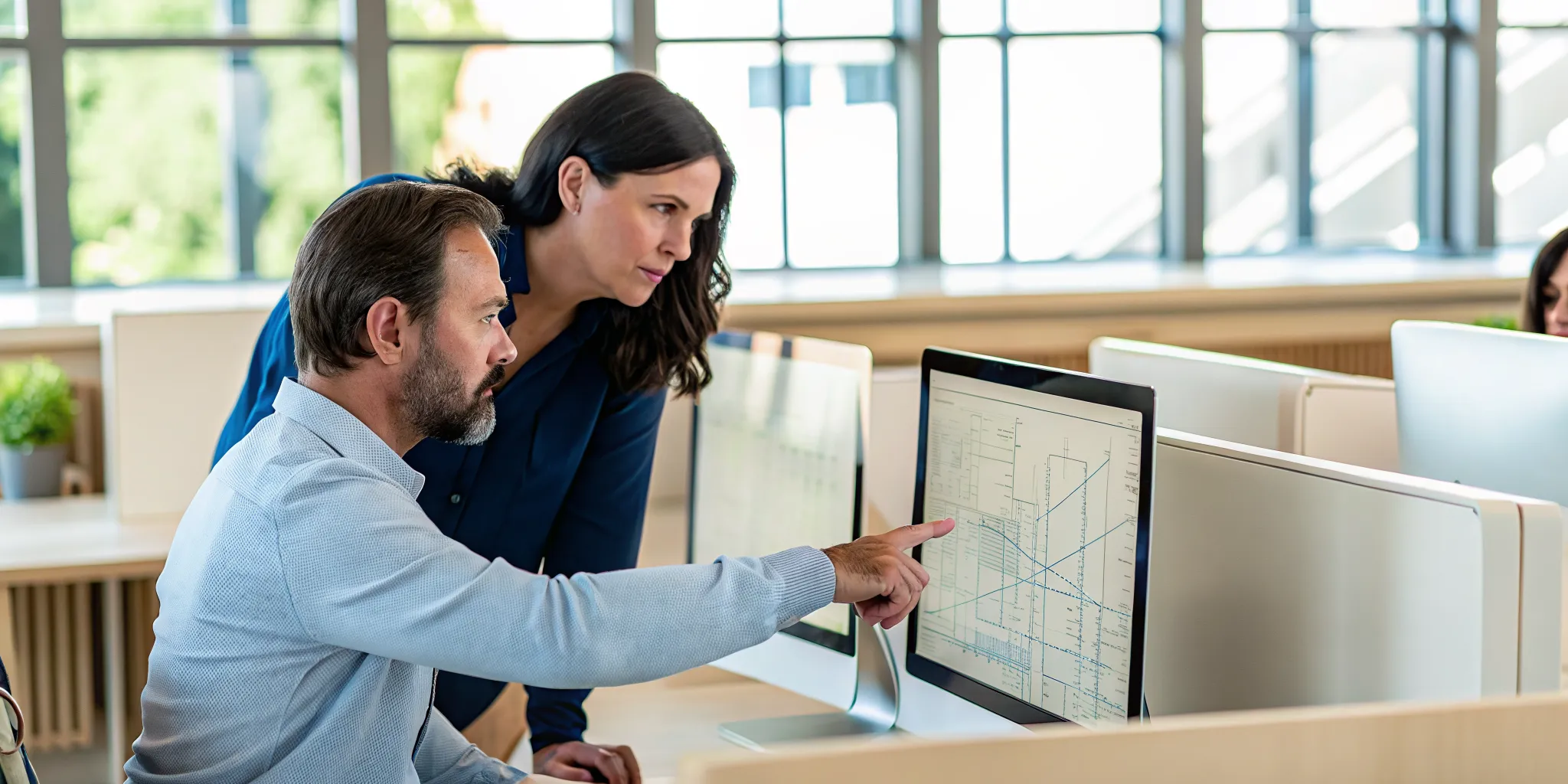 Small business IT team reviewing a cloud migration dependency plan