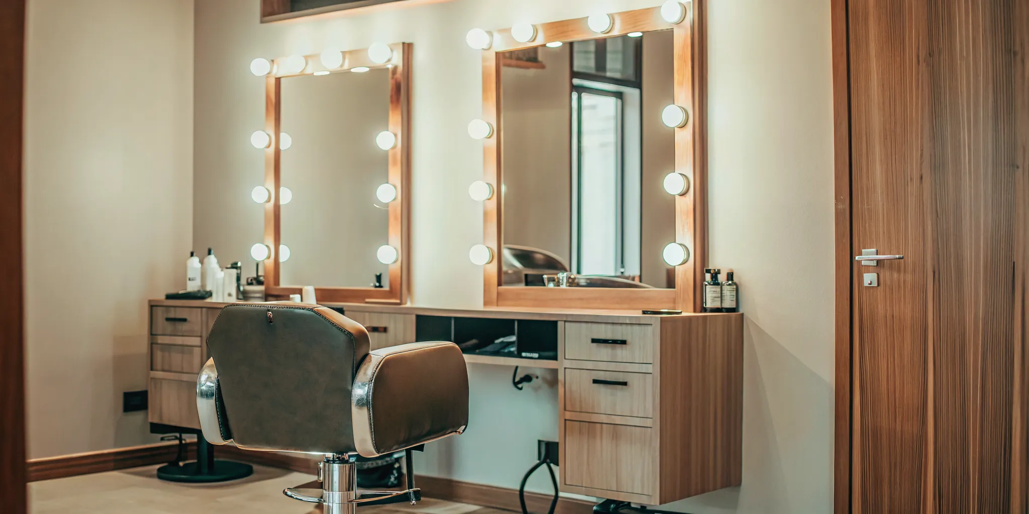 Move-in-ready private salon suite with styling station and shampoo bowl