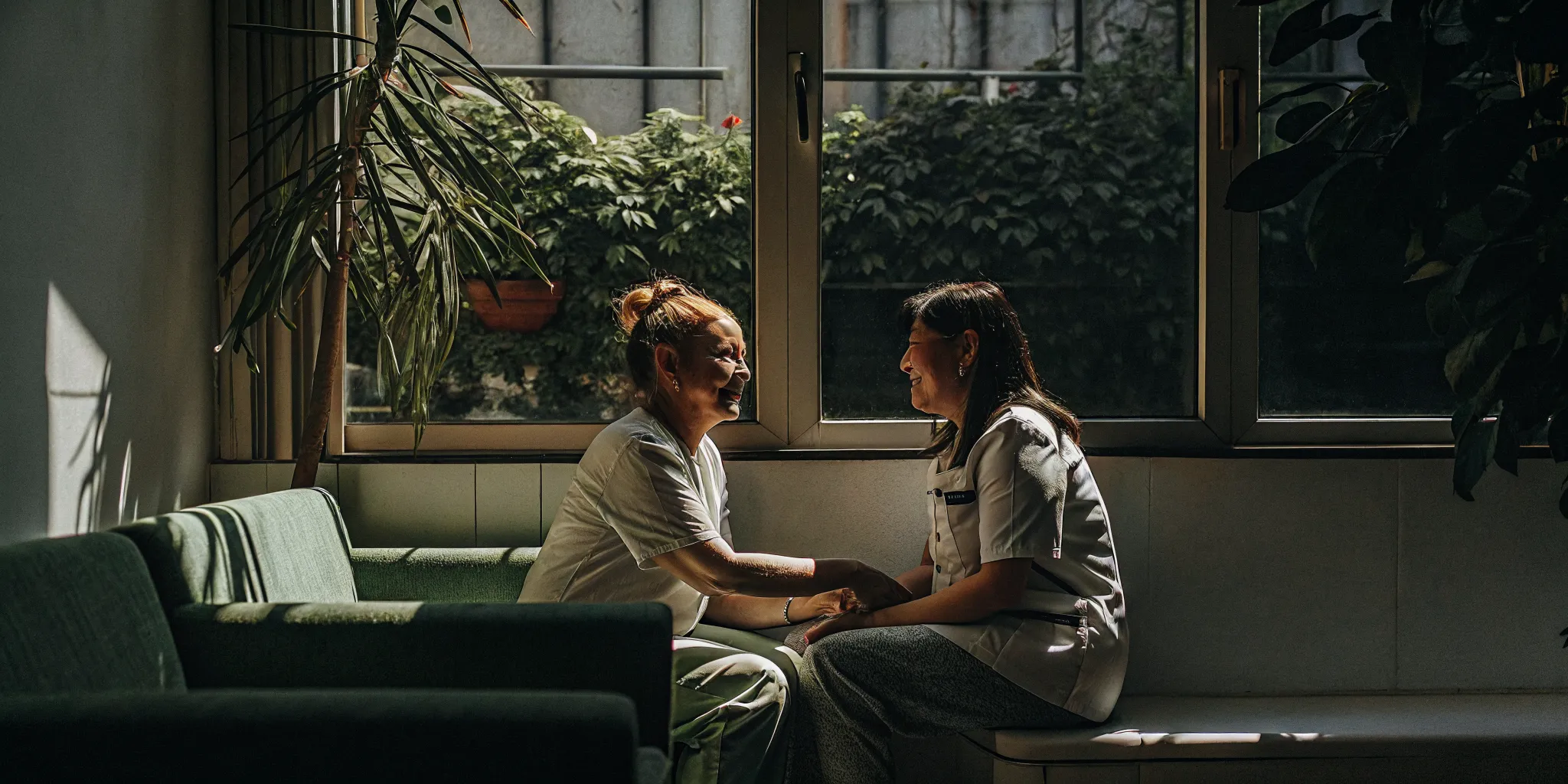 Woman consulting with a nurse practitioner about hormone health options in a bright medical office