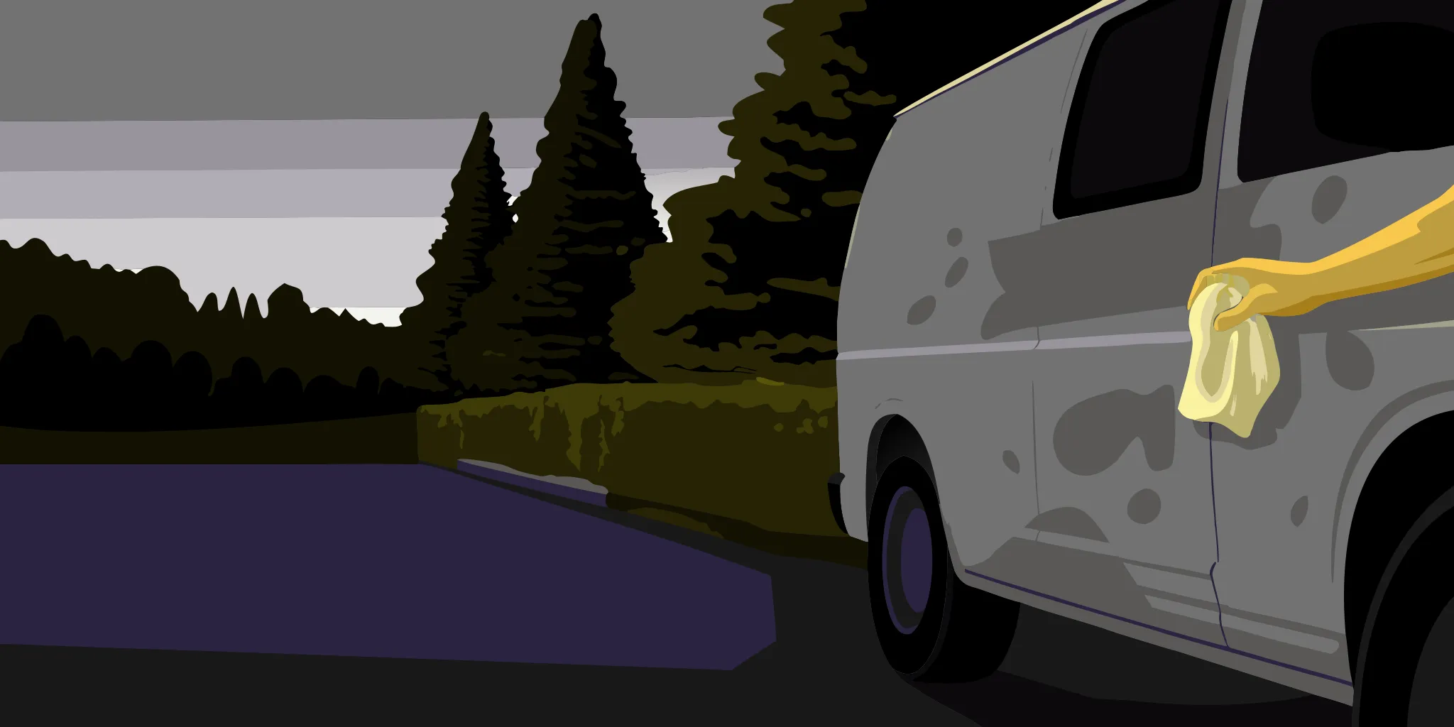 Team member gently washing fleet graphics on a service van