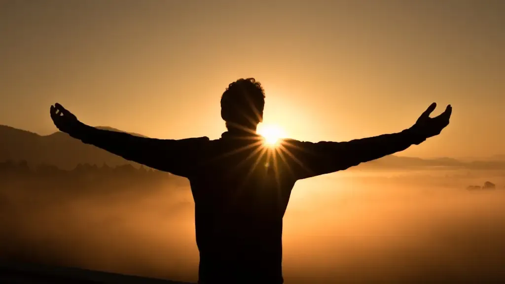 Person reflecting peacefully in nature representing authentic spiritual practice and emotional honesty