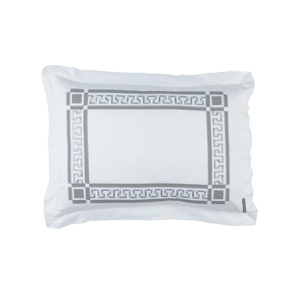 Dimitri decorative pillow showing a layered bedroom textile trend