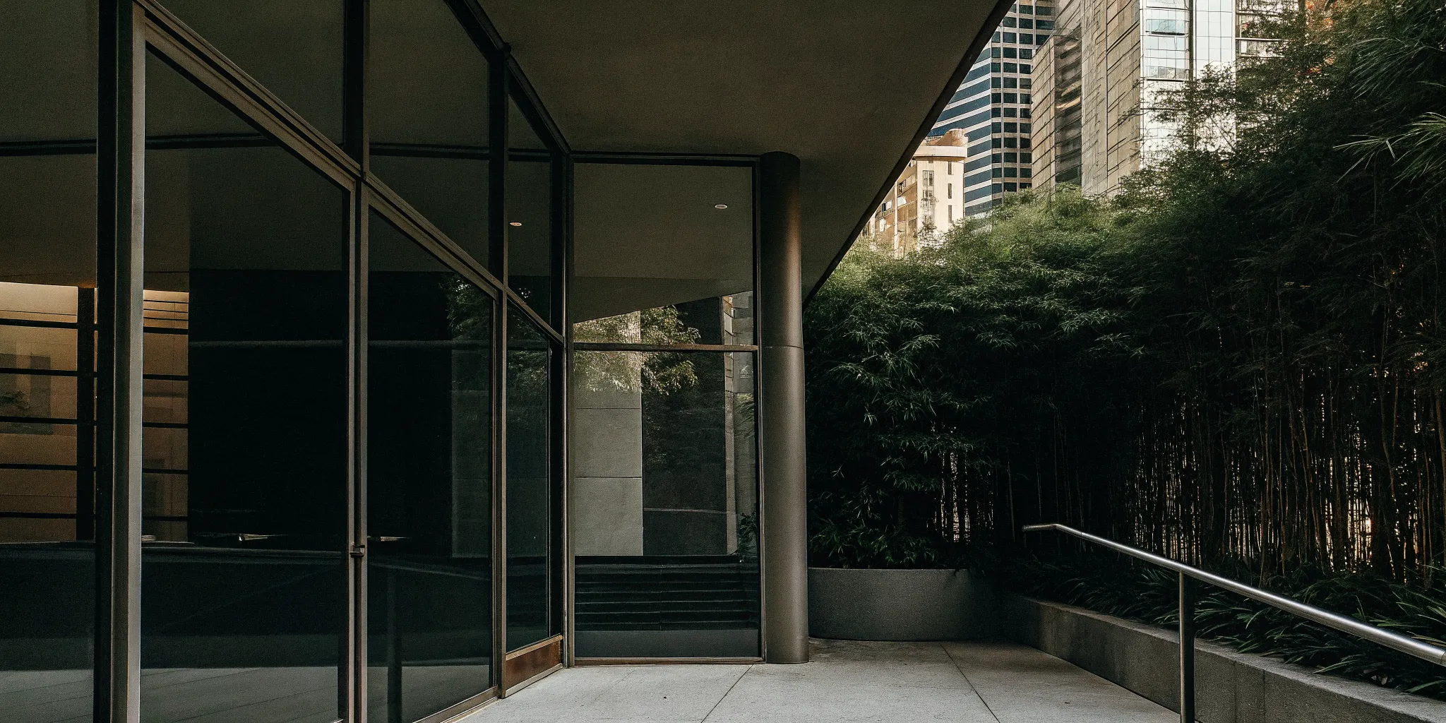 Modern commercial real estate office building representing DST sponsor headquarters and investment properties for 1031 exchanges